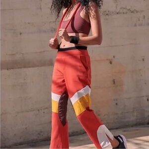 Free People Red Straight Leg Pants with Yellow and Gray Accents